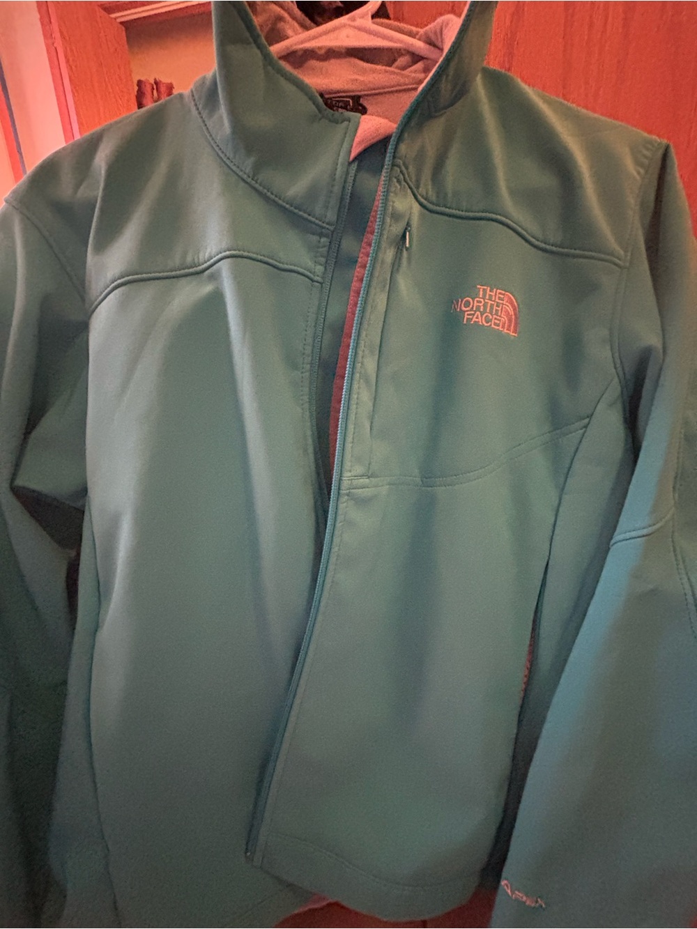 The North Face Apex teal softshell jacket